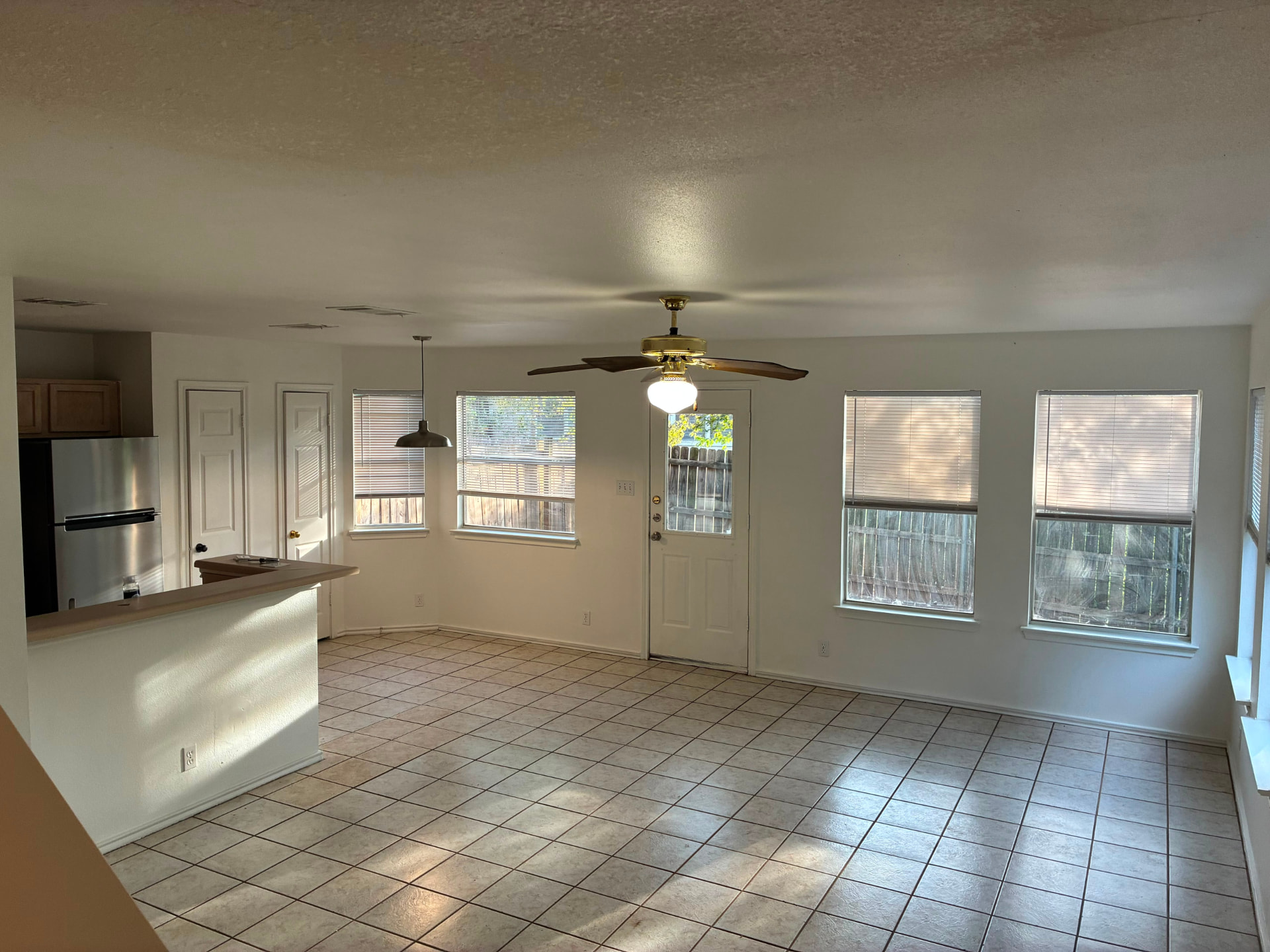 Open living and kitchen area before and after make ready repaint after — Michael Douglas Make Ready