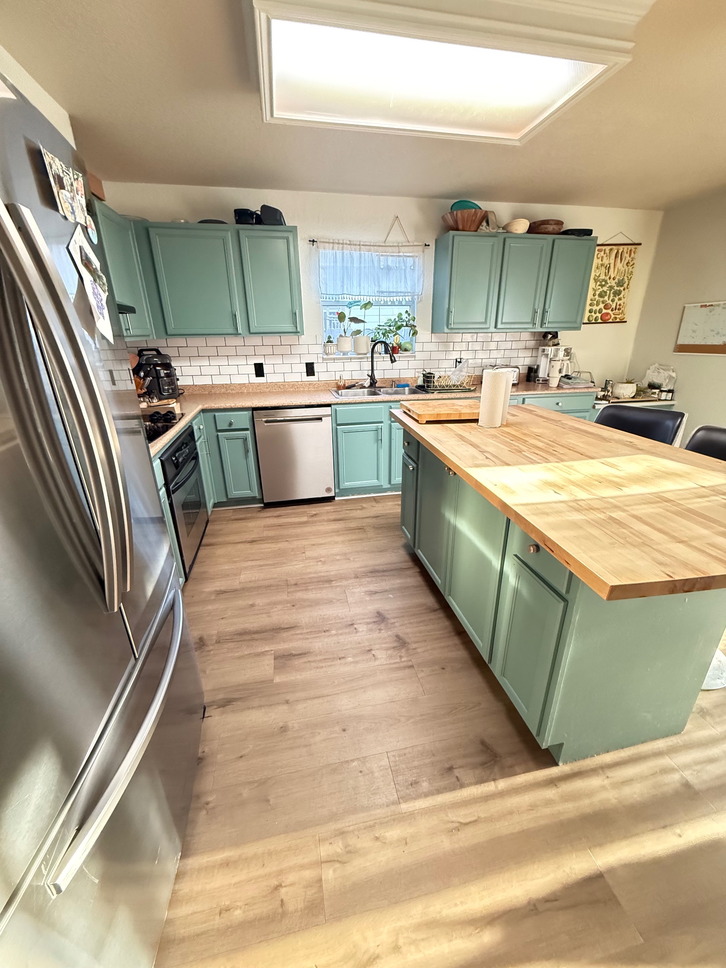 Kitchen refresh — paint & new flooring — Michael Douglas Make Ready